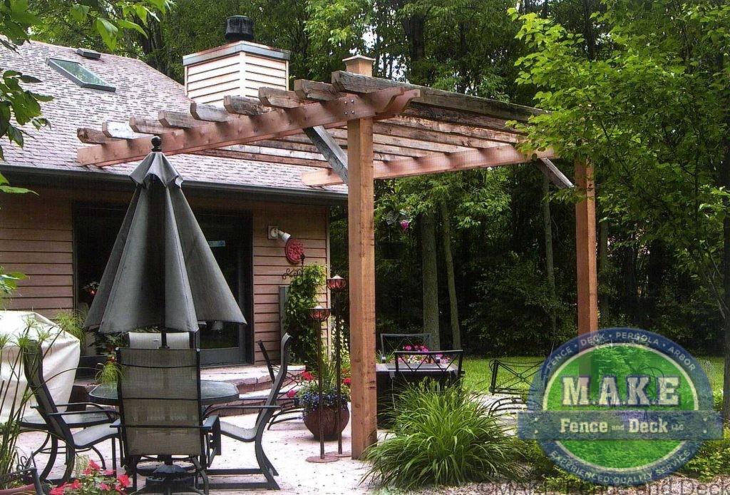 Cedar pergola attached to roof