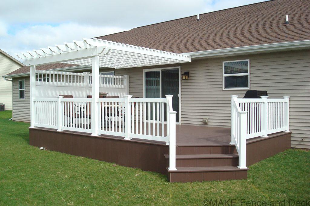 White vinyl pergola mounted on deck attached to house